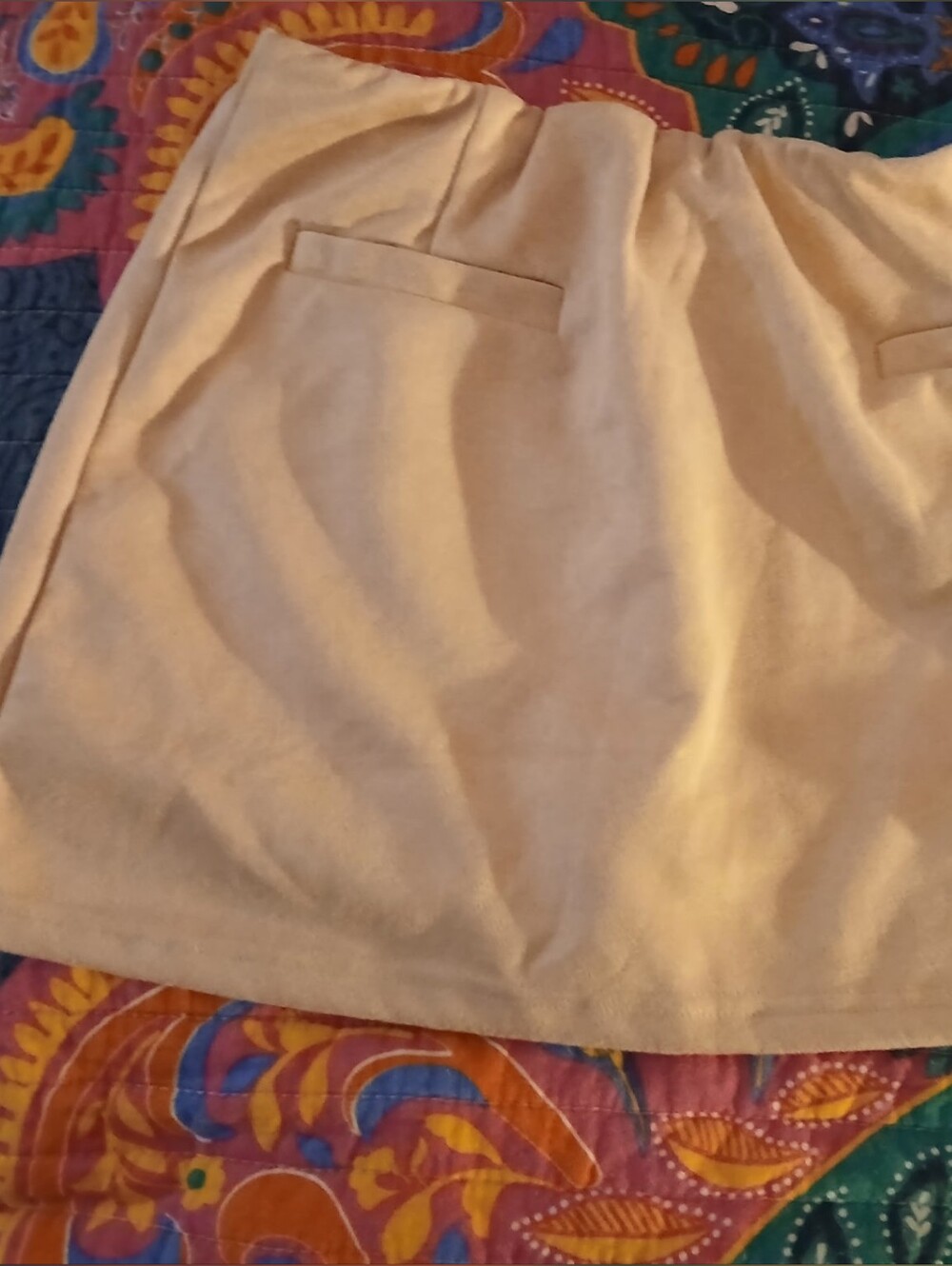 Poeselle women's small beige mini skirt